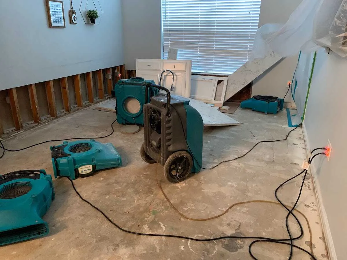 Dehumidifier in flood-cut room for Water Damage Restoration in Raton